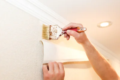 Pose de papier peint à Aurin — revêtements muraux et toiles de verre
